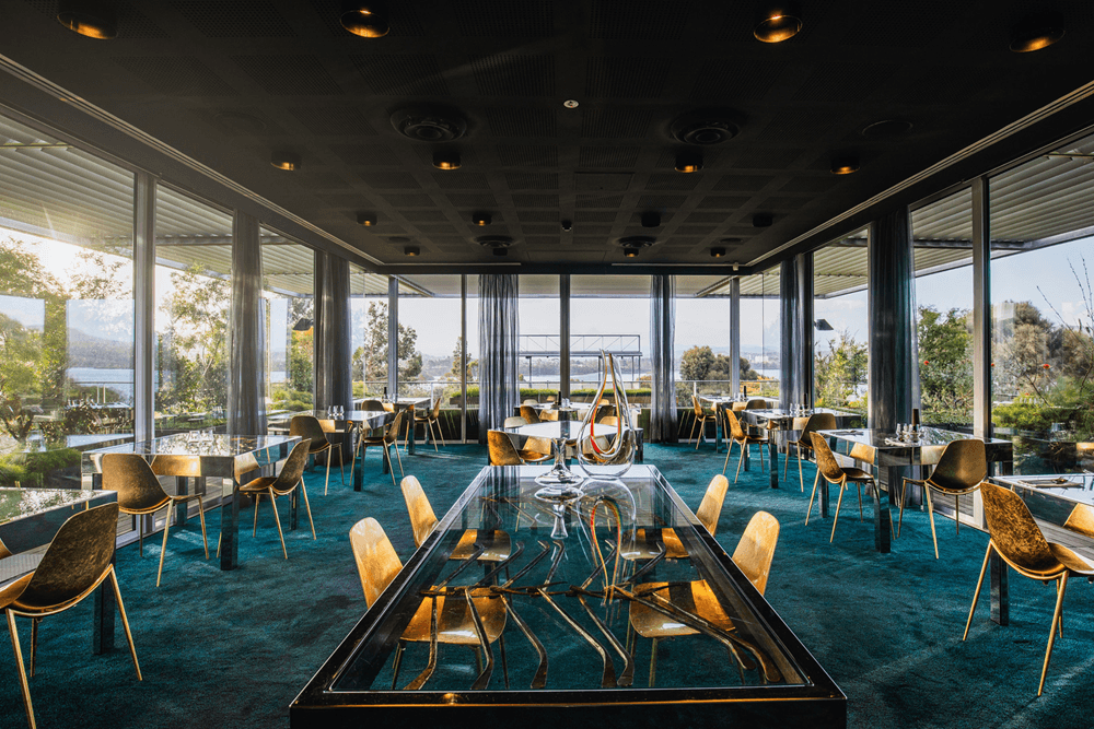 Gold chairs, glass tables and plush carpet of the Source awaiting diners